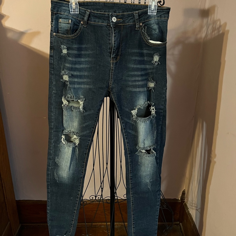 Distressed jeans. Very stretchy.